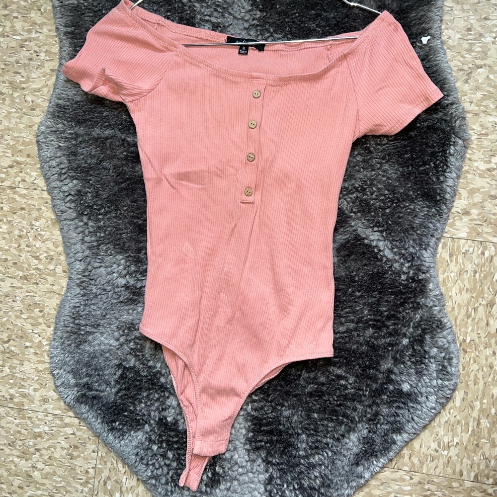 Pink shoulder body suit